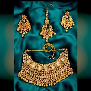 Gold toned choker embellished with brown Austrian diamonds